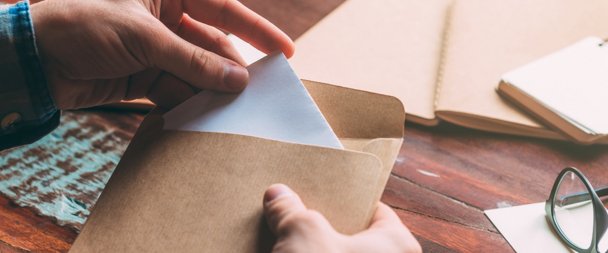 stuffing an envelope
