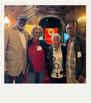 Dennis and friends at Dahod Family Alumni Center