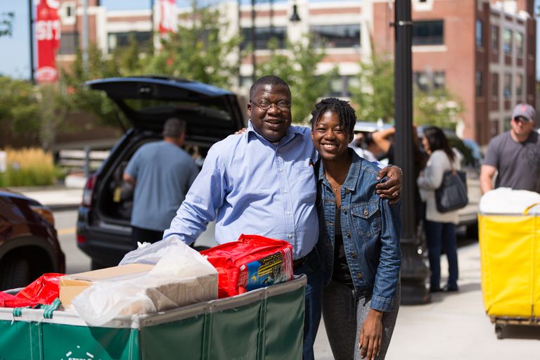 student and parent on move-in day